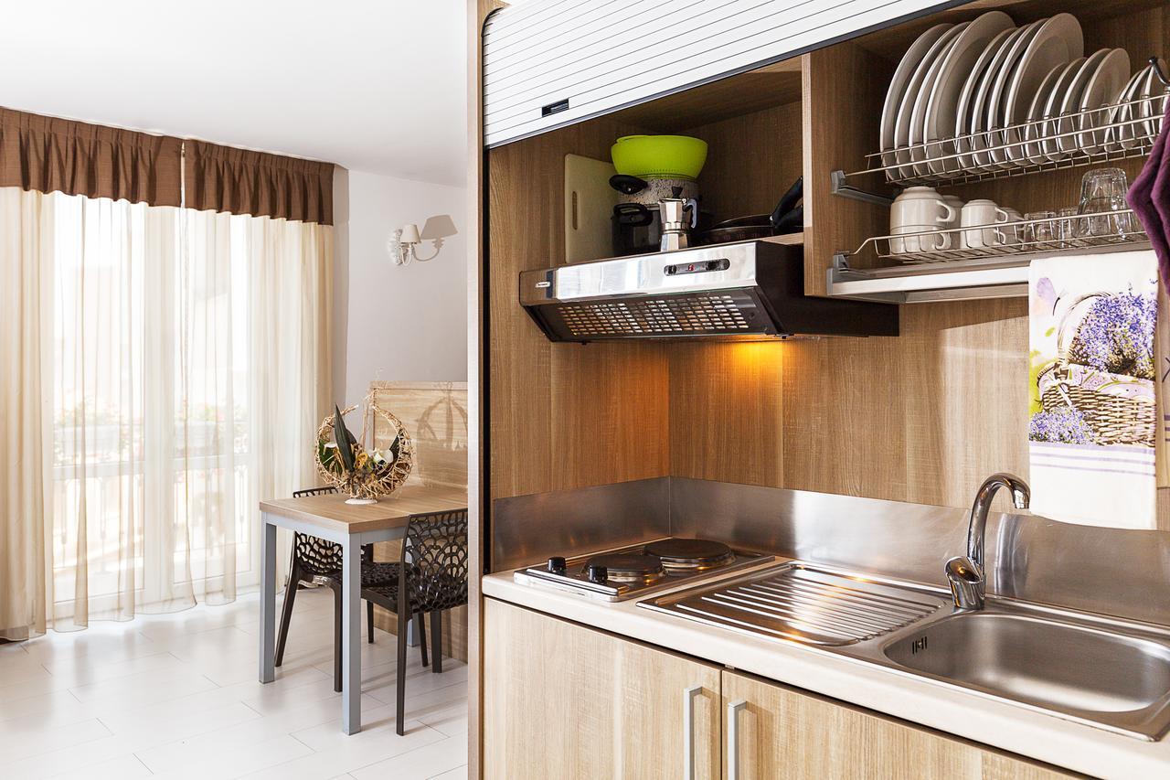 Le Residenze Del Centro Aparthotel Олбия Екстериор снимка