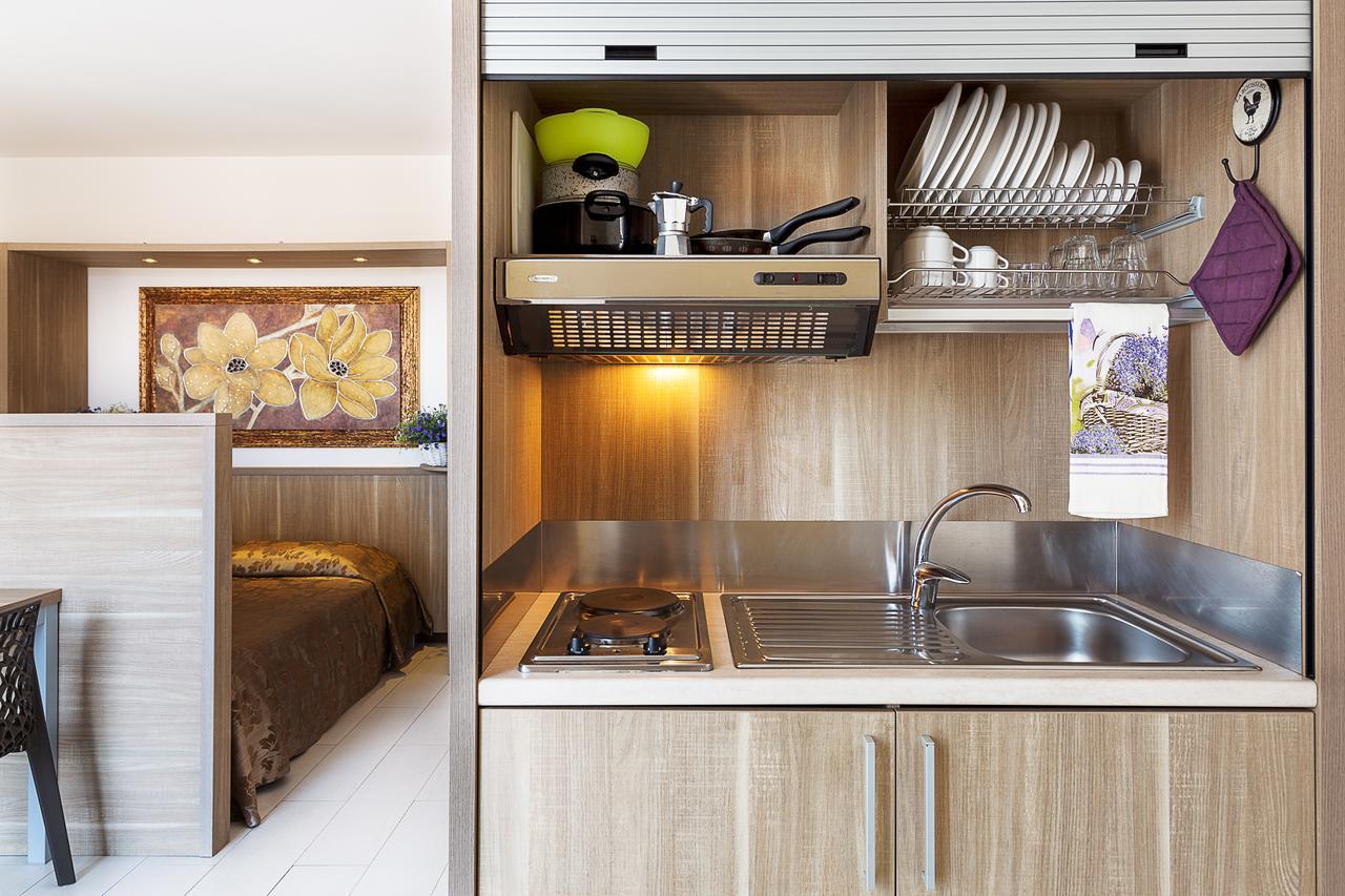 Le Residenze Del Centro Aparthotel Олбия Екстериор снимка