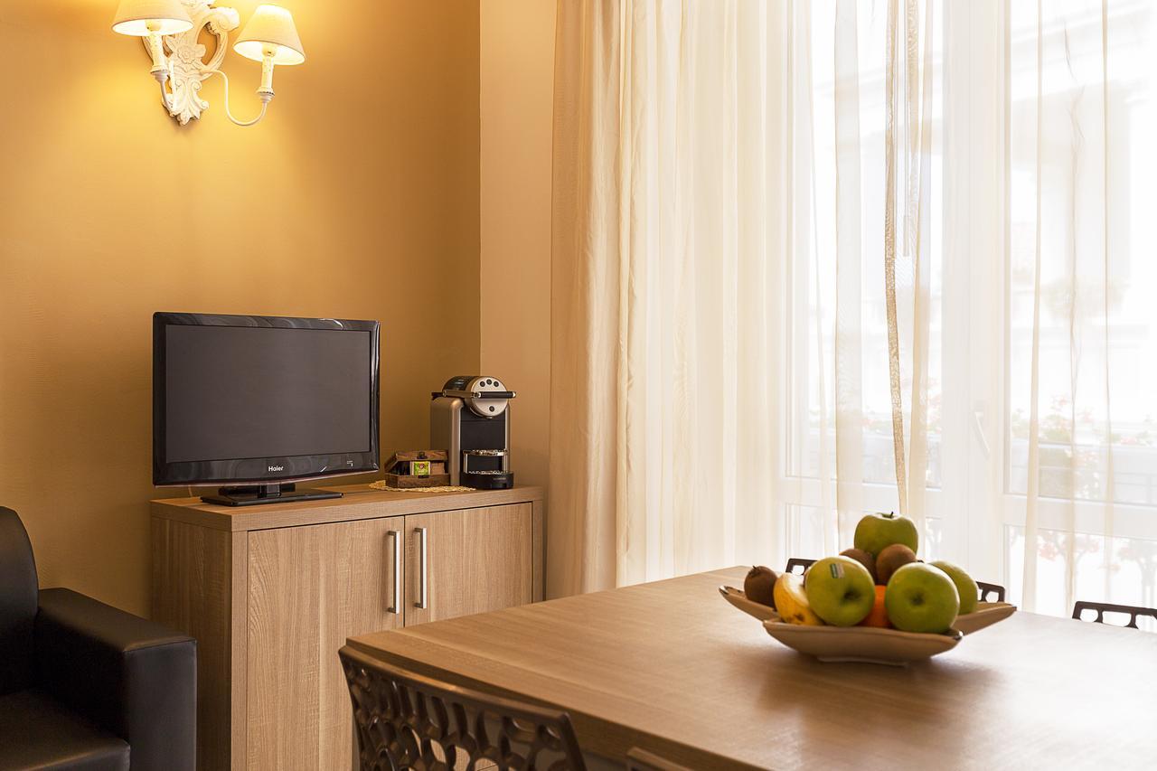 Le Residenze Del Centro Aparthotel Олбия Екстериор снимка