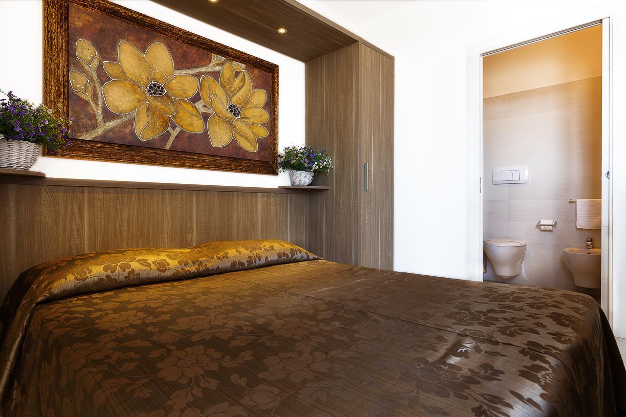 Le Residenze Del Centro Aparthotel Олбия Екстериор снимка