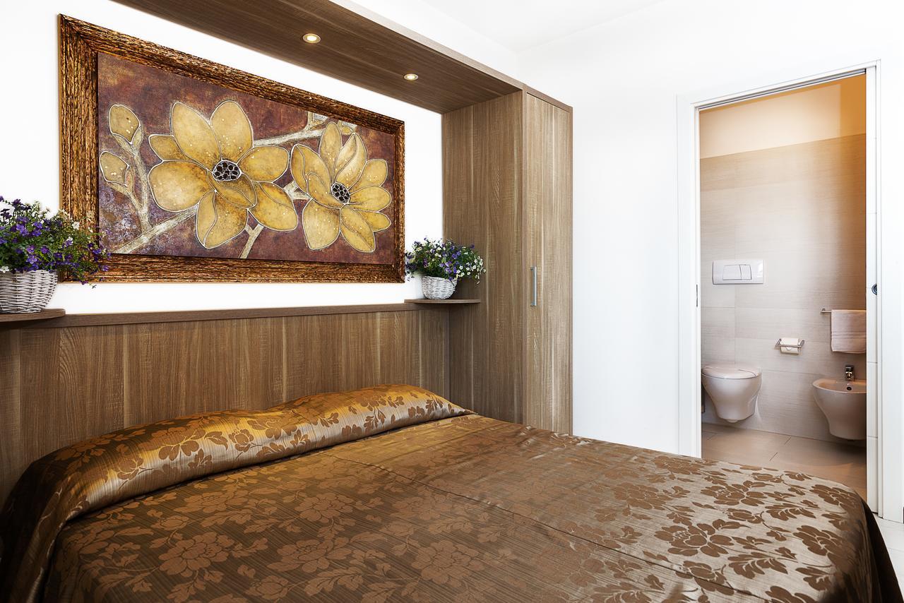 Le Residenze Del Centro Aparthotel Олбия Екстериор снимка