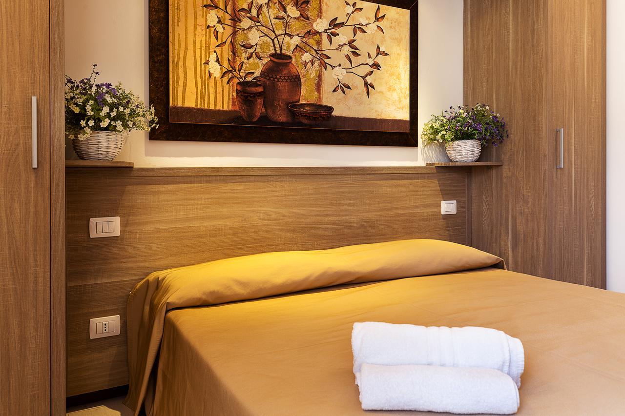 Le Residenze Del Centro Aparthotel Олбия Екстериор снимка