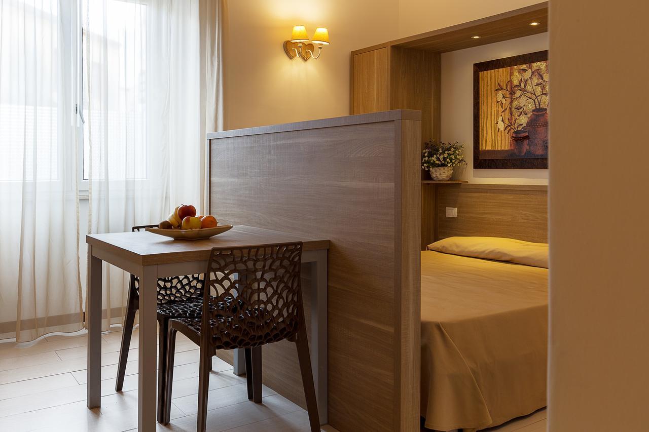 Le Residenze Del Centro Aparthotel Олбия Екстериор снимка