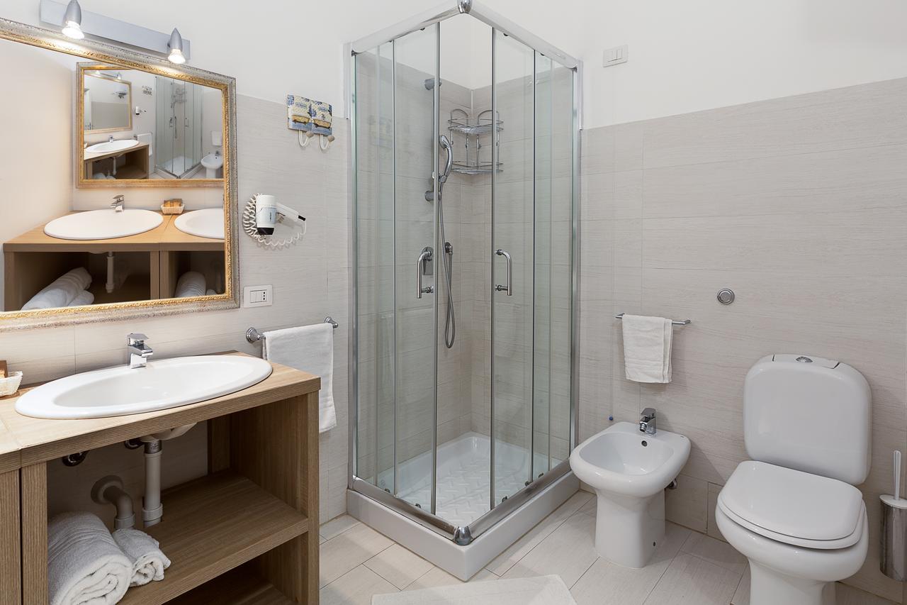 Le Residenze Del Centro Aparthotel Олбия Екстериор снимка