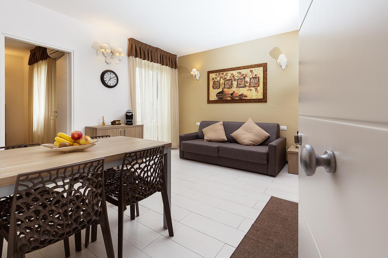Le Residenze Del Centro Aparthotel Олбия Екстериор снимка