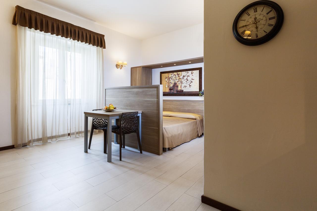 Le Residenze Del Centro Aparthotel Олбия Екстериор снимка
