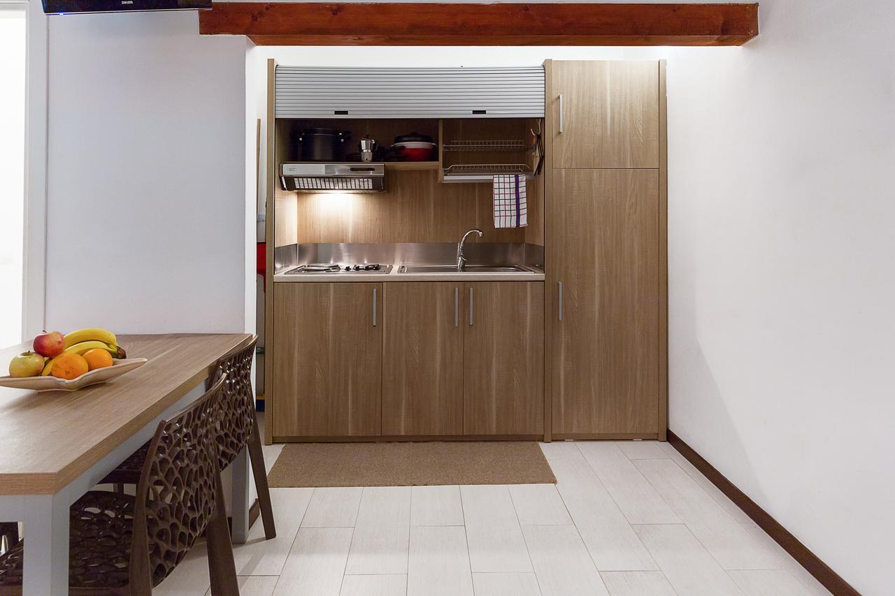 Le Residenze Del Centro Aparthotel Олбия Екстериор снимка