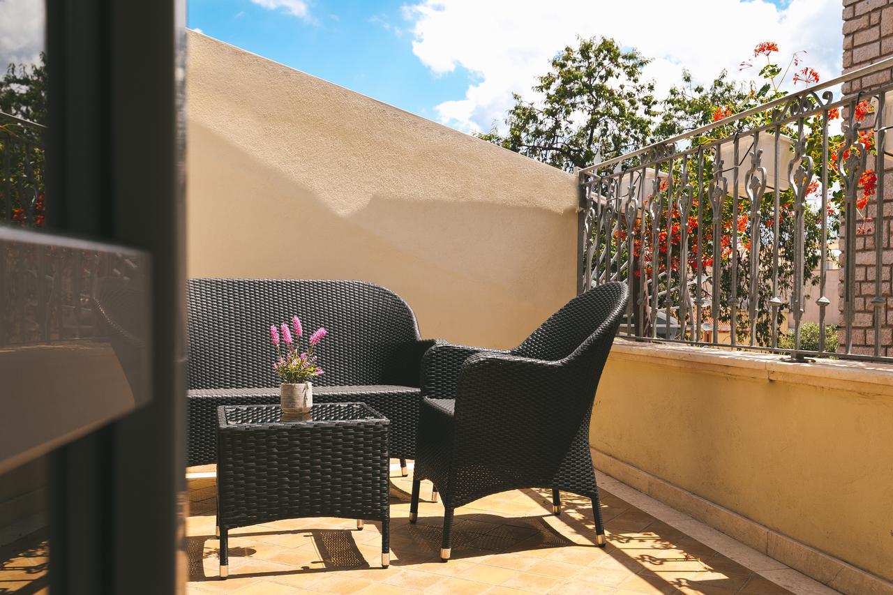 Le Residenze Del Centro Aparthotel Олбия Екстериор снимка