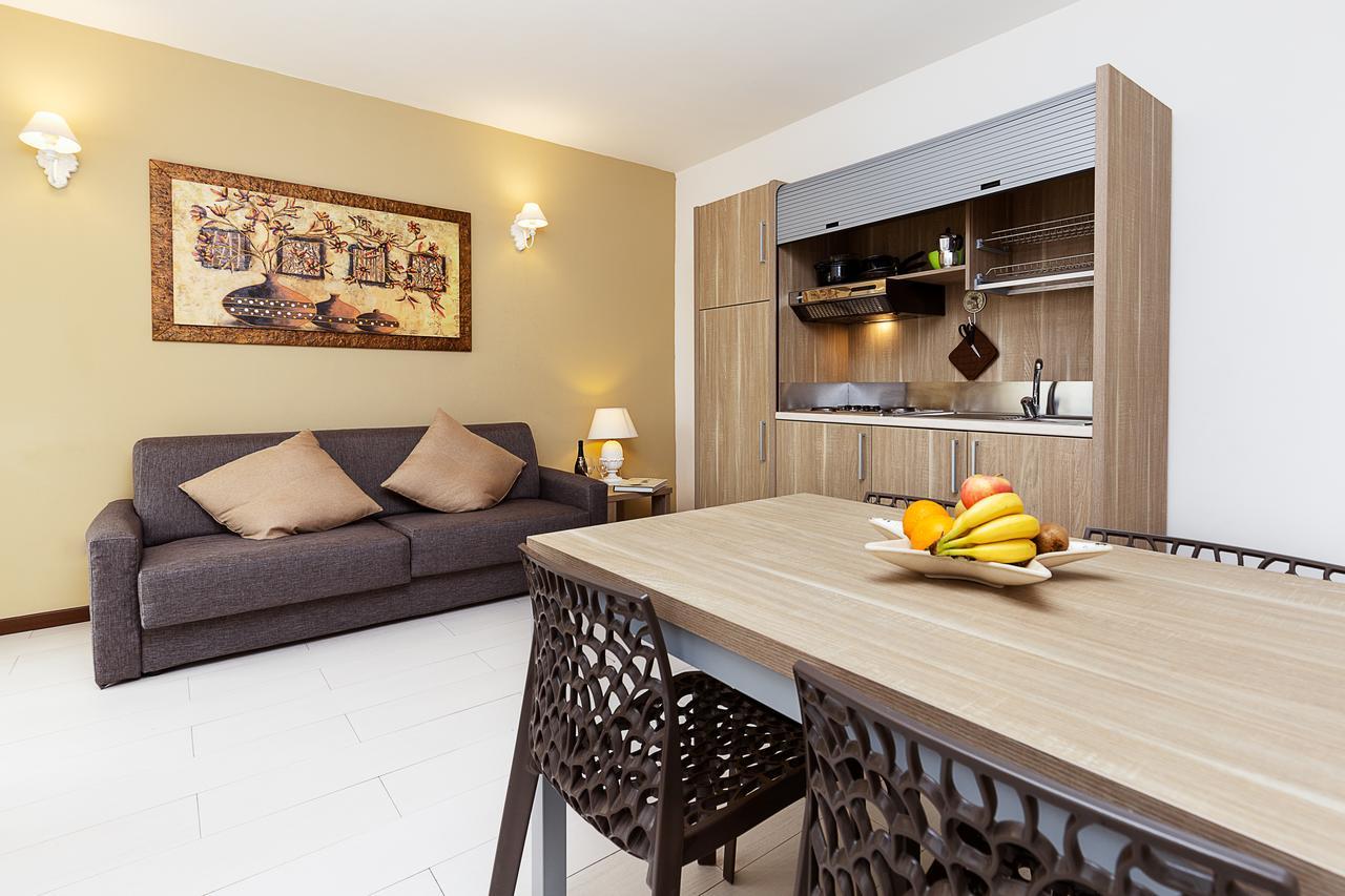 Le Residenze Del Centro Aparthotel Олбия Екстериор снимка